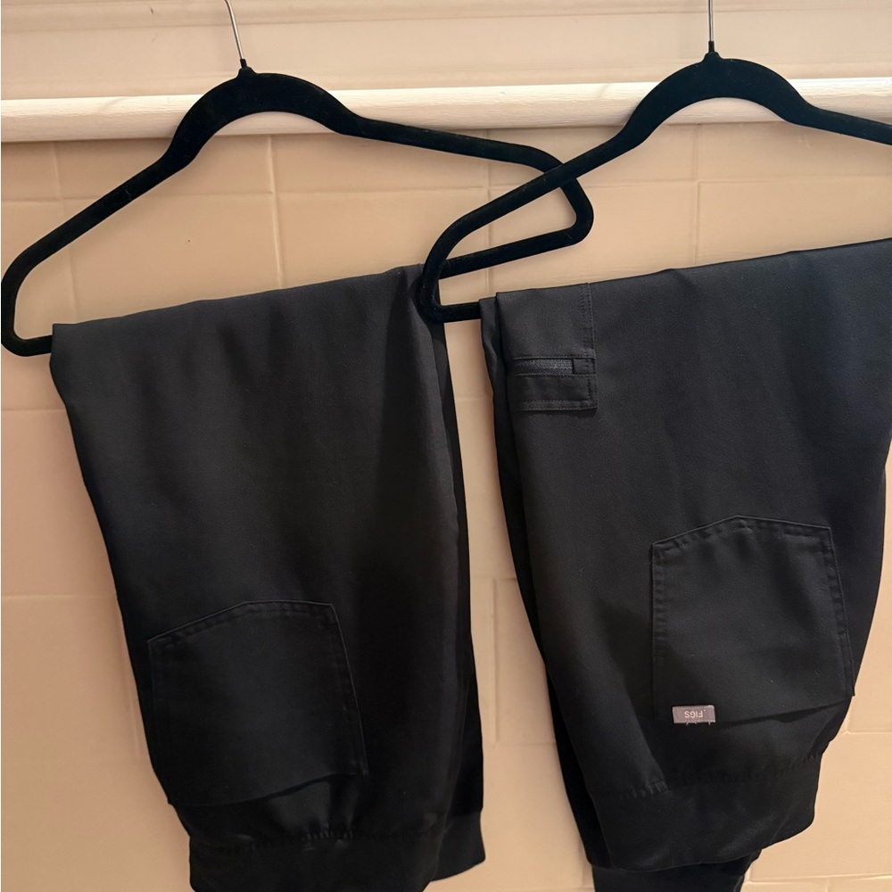 Two pair of identical FIGS Technical Collection size XL jogger scrub pants.